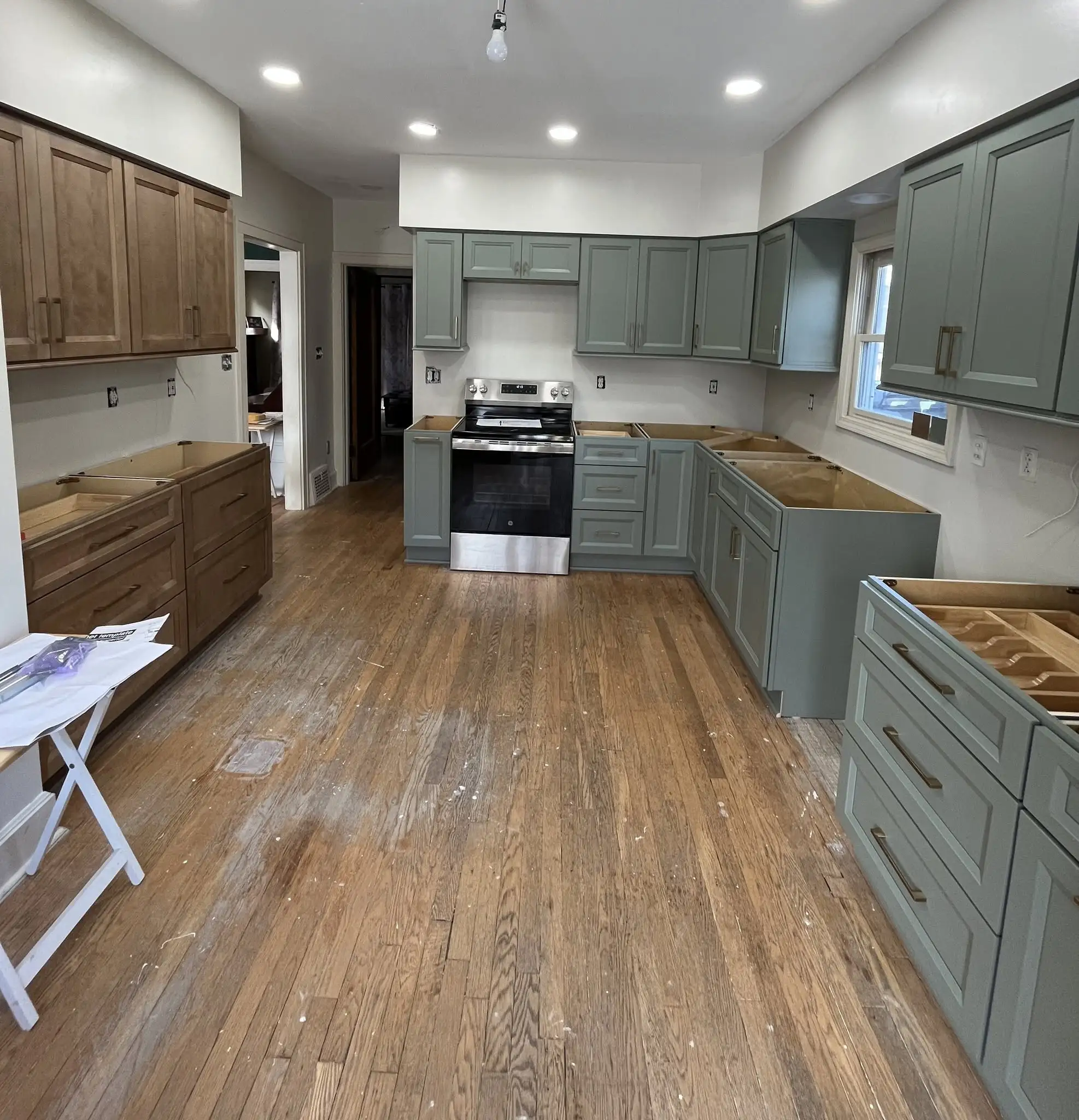 Bevel Green and Shaker Driftwood cabinets in a Maple Heights Ohio kitchen