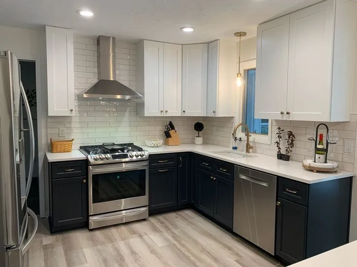 Charcoal kitchen cabinets with stainless steel appliances in Oberlin Ohio