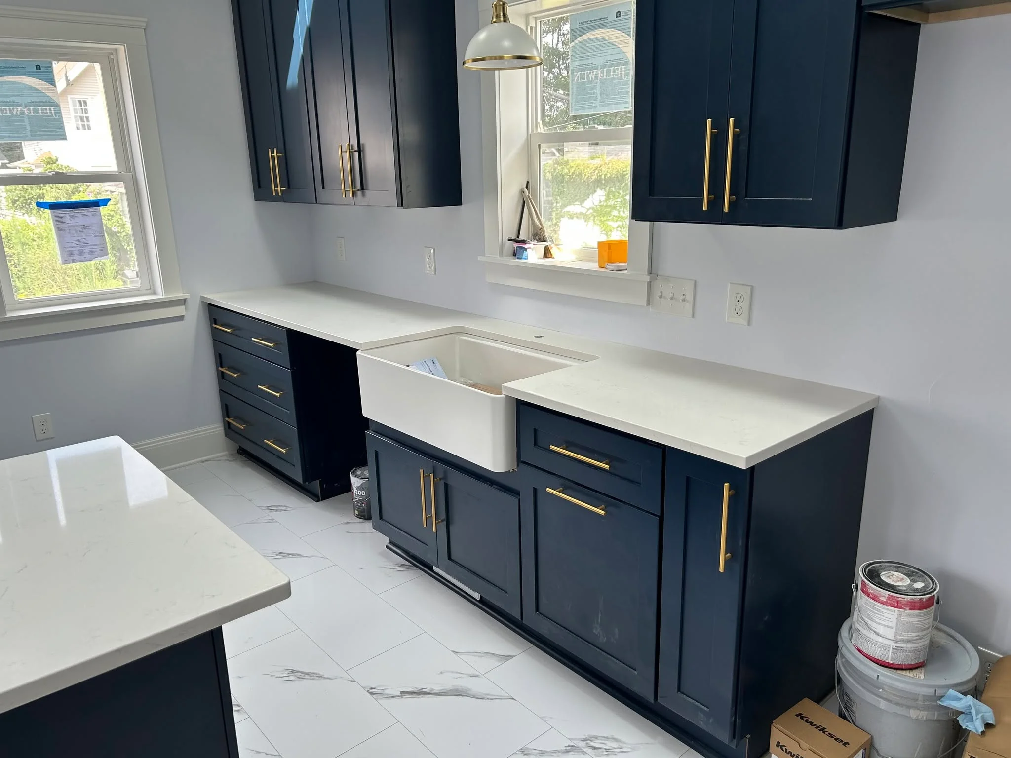 Navy blue shaker kitchen cabinets in a Willowick Ohio home