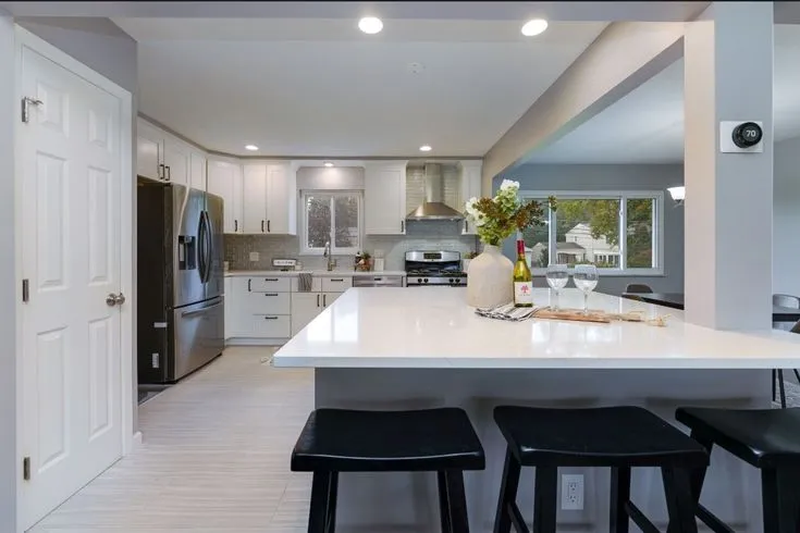 White kitchen remodel with island seating in Bay Village Ohio