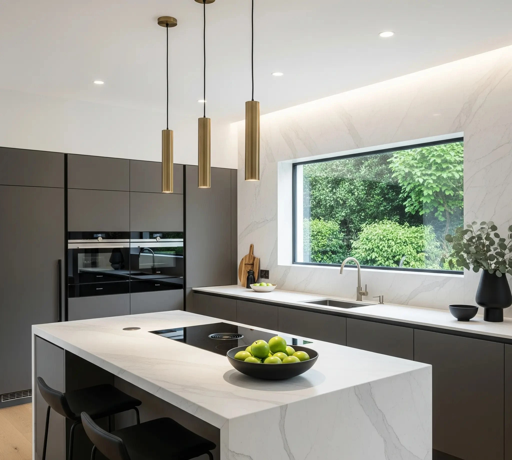 Modern charcoal kitchen remodel with a white waterfall island